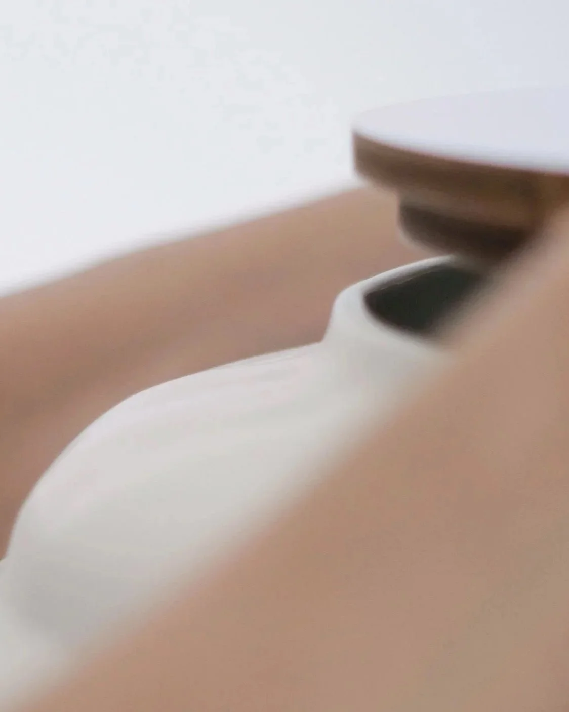 Detail of a hand-coiled Ampla stoneware piece by SOIO Studio