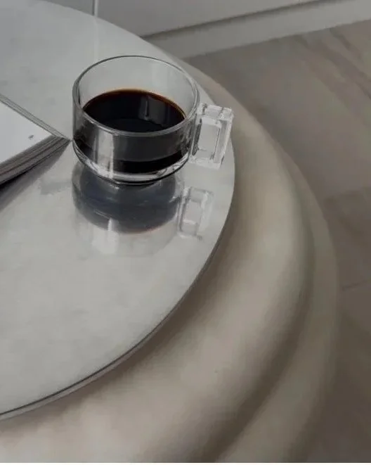 SOIO Studio Ampla x Lume side table in use with a coffee cup and a book