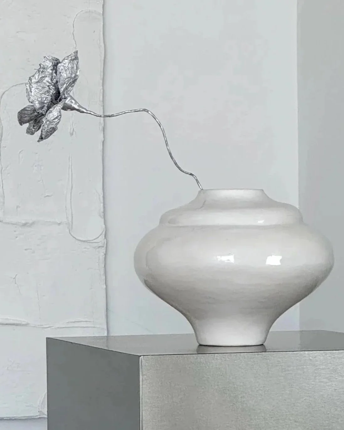 SOIO Studio ceramic vase styled with a single stem. Ikebana