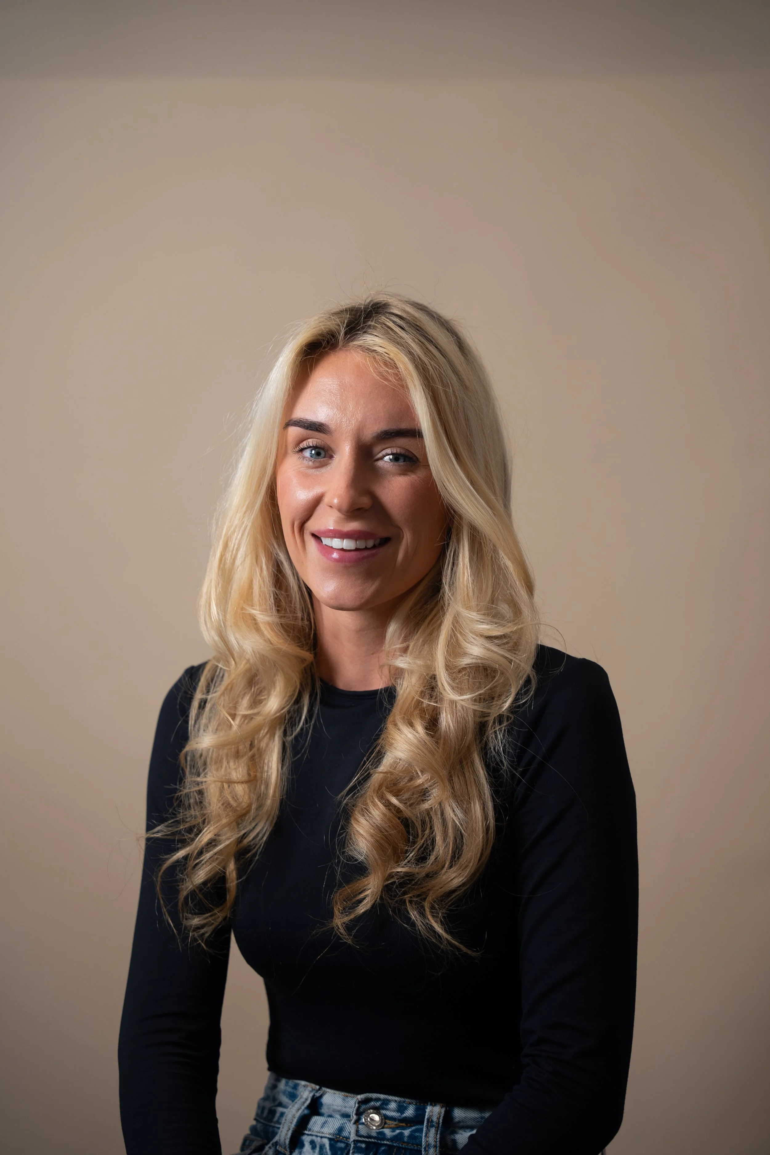 A headshot of Morgan, a barber at Cresswell