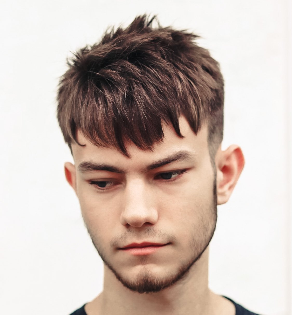 Young man with a new short haircut with a fringe from Cresswell Barber Co in Southampton