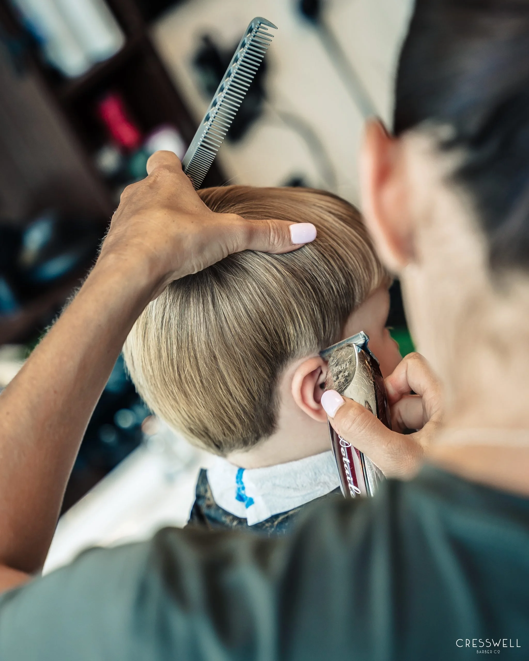 Boy getting his haircut at Cresswell Barber in Southampton