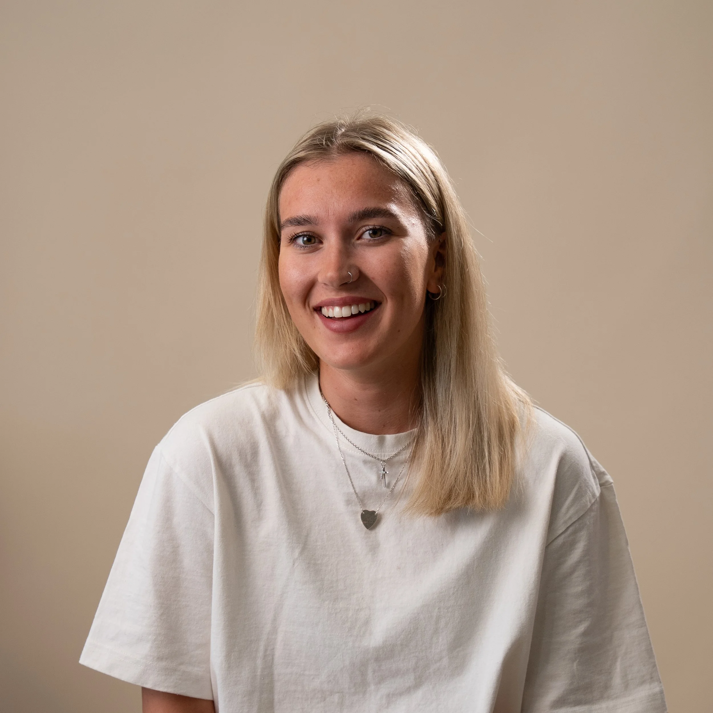 A photograph of Charlotte Webb, a barber at Cresswell Barber Co.