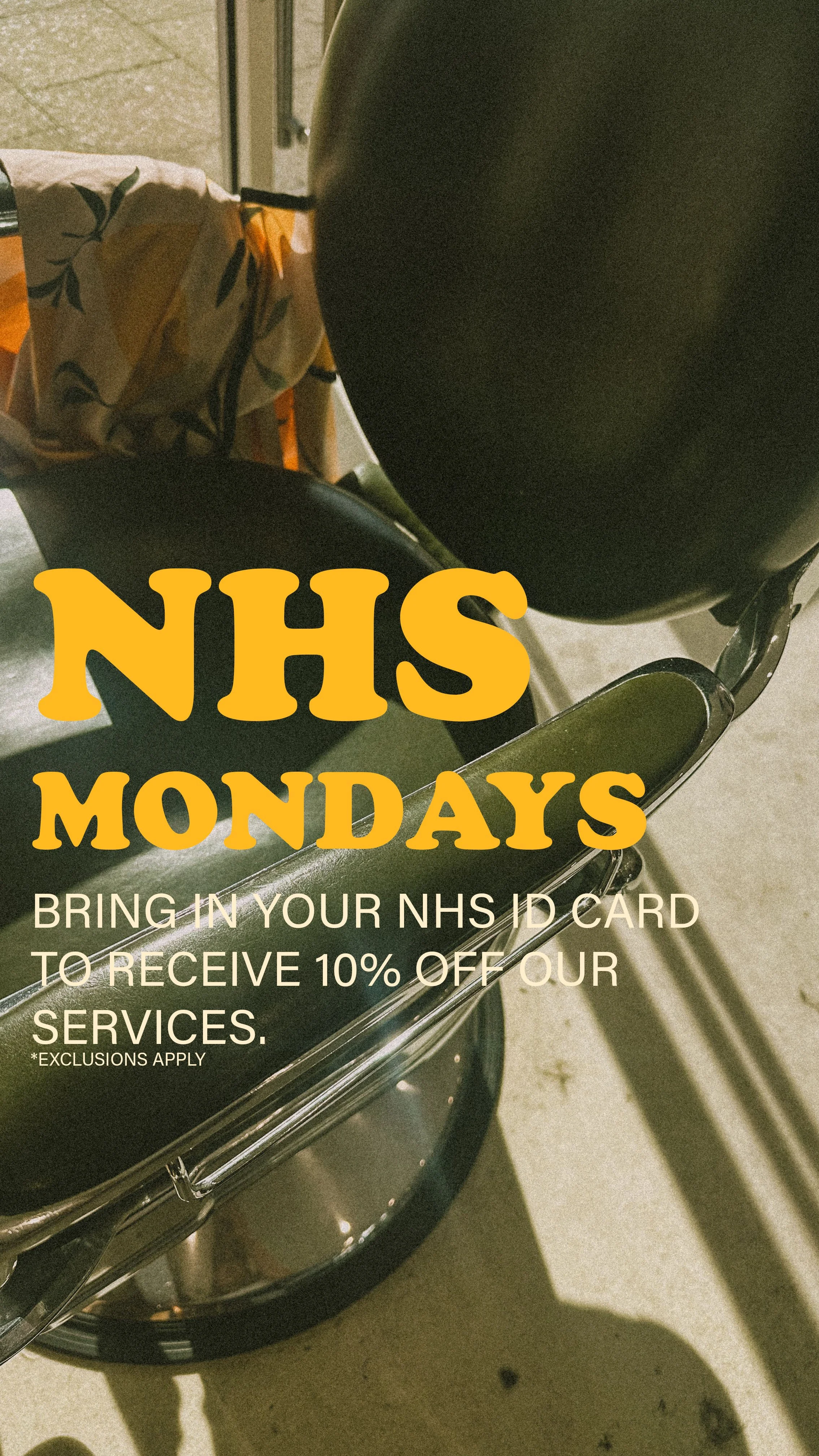 A poster promoting NHS discounts on Mondays at Cresswell Barber Co