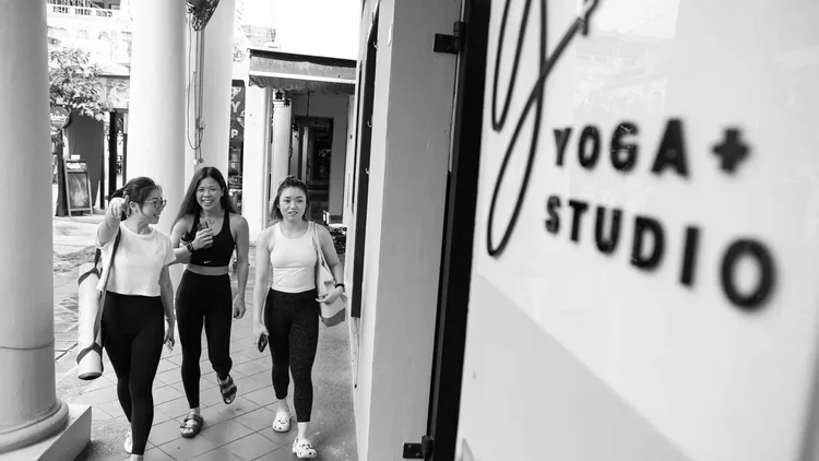 Students arriving at Yoga+ Studio