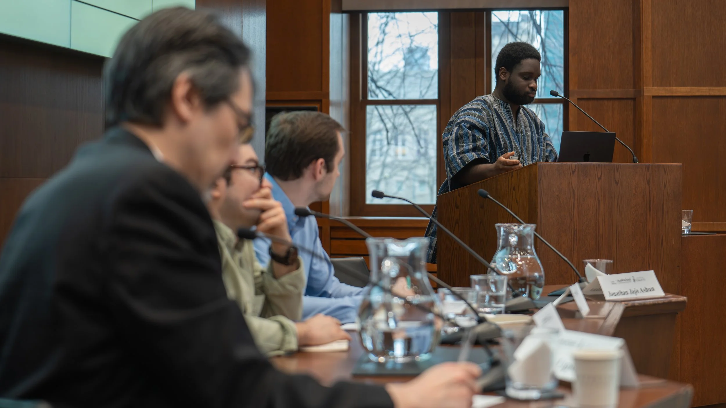 Graduate Fellow Jojo Ashun presents his research on China’s infrastructure projects in Africa