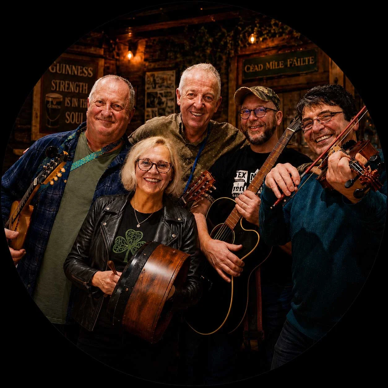 Six people smiling and holding musical instruments in a cozy, rustic pub with wall signs.