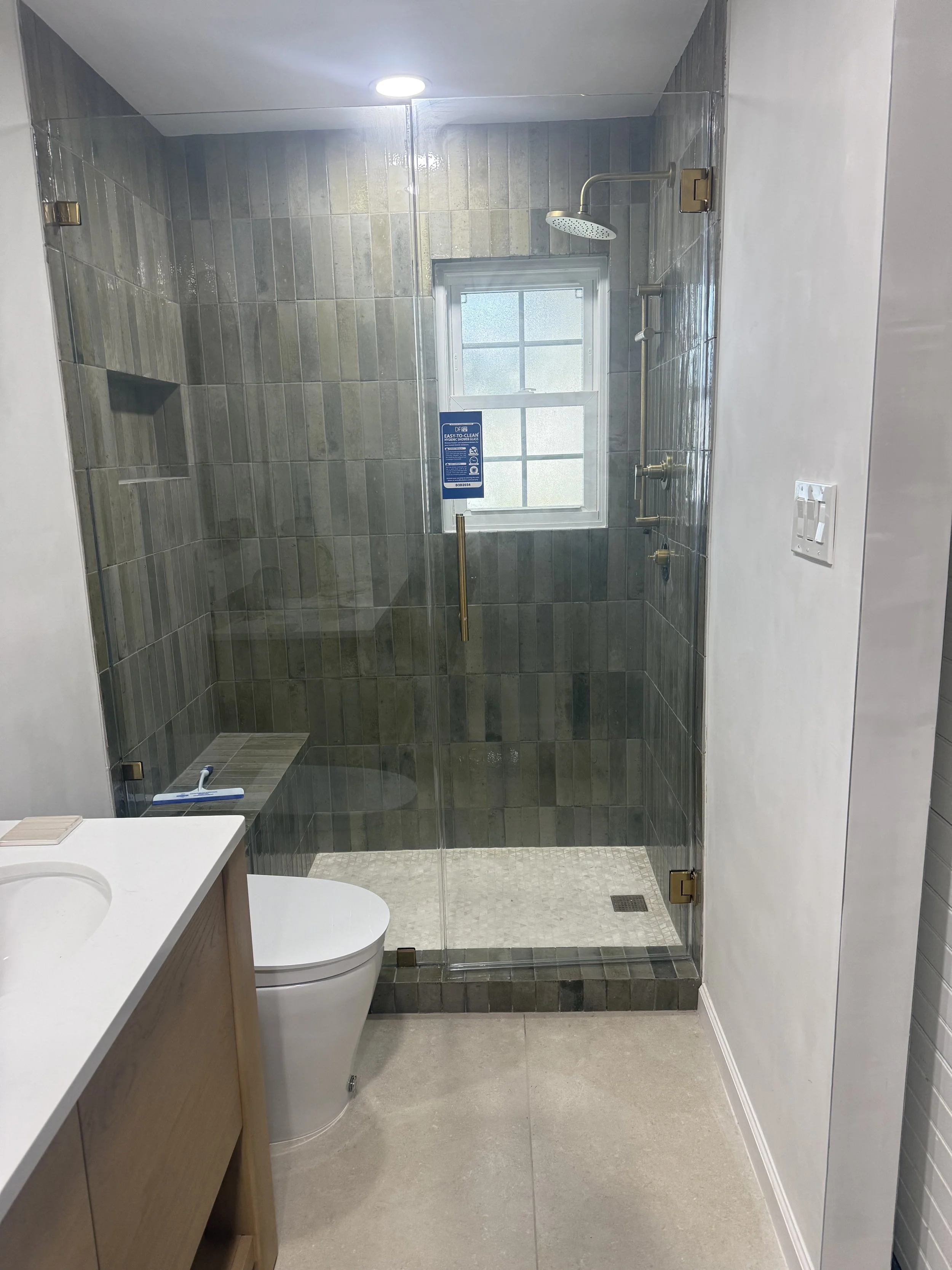 Custom Bathroom Tile Installation: Large Format Floor & Mitered Vertical Subway Shower