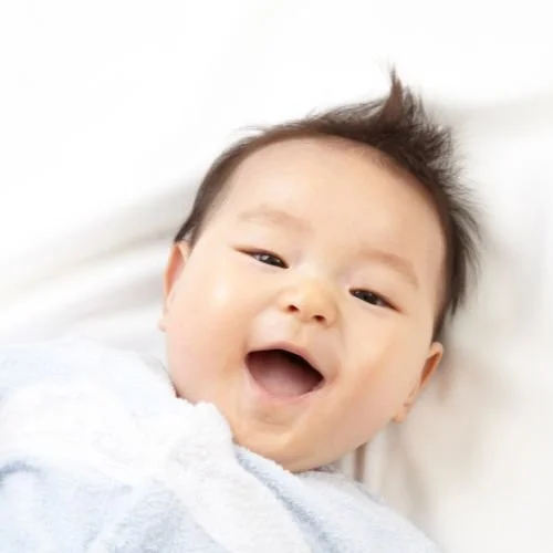 smiling asian baby