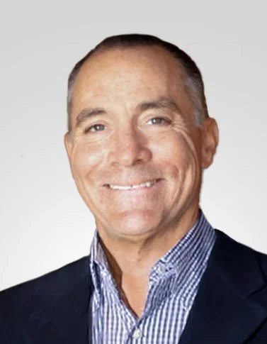 Smiling man in checkered shirt with wooden background