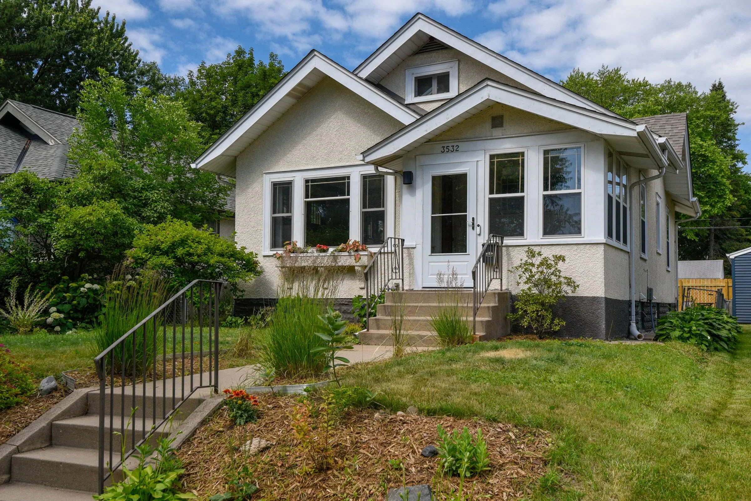 This yard had been landscaped at one point but had not been cared for in quite awhile. The sellers wanted a quick and easy transformation so that the outside matched the well-cared for inside. By relocating many plants throughout the yard, we were ab
