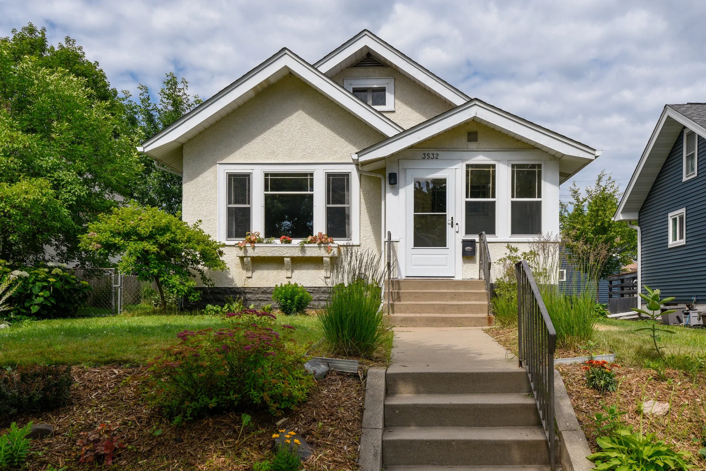 This yard had been landscaped at one point but had not been cared for in quite awhile. The sellers wanted a quick and easy transformation so that the outside matched the well-cared for inside. By relocating many plants throughout the yard, we were ab