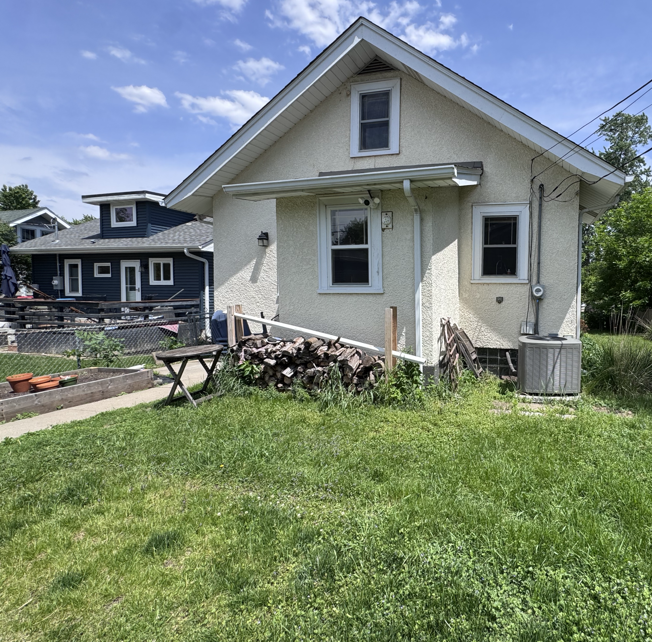 This yard had been landscaped at one point but had not been cared for in quite awhile. The sellers wanted a quick and easy transformation so that the outside matched the well-cared for inside. By relocating many plants throughout the yard, we were ab