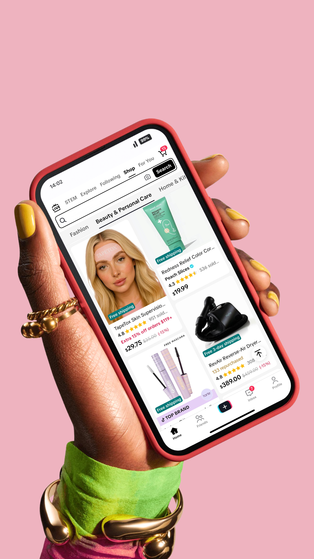 A person with yellow painted nails holding a smartphone with an online shopping app open, displaying beauty and personal care products, against a pink background.