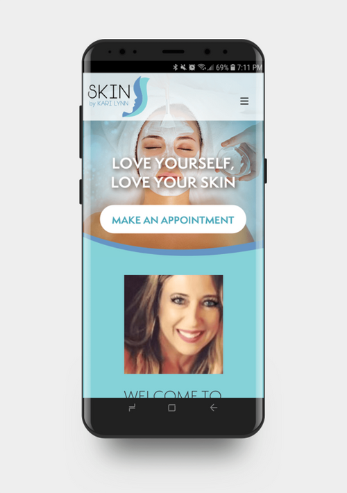 Mobile phone screen displaying a skincare appointment website with a smiling woman and the text "Love yourself, love your skin" and a "Make an appointment" button.