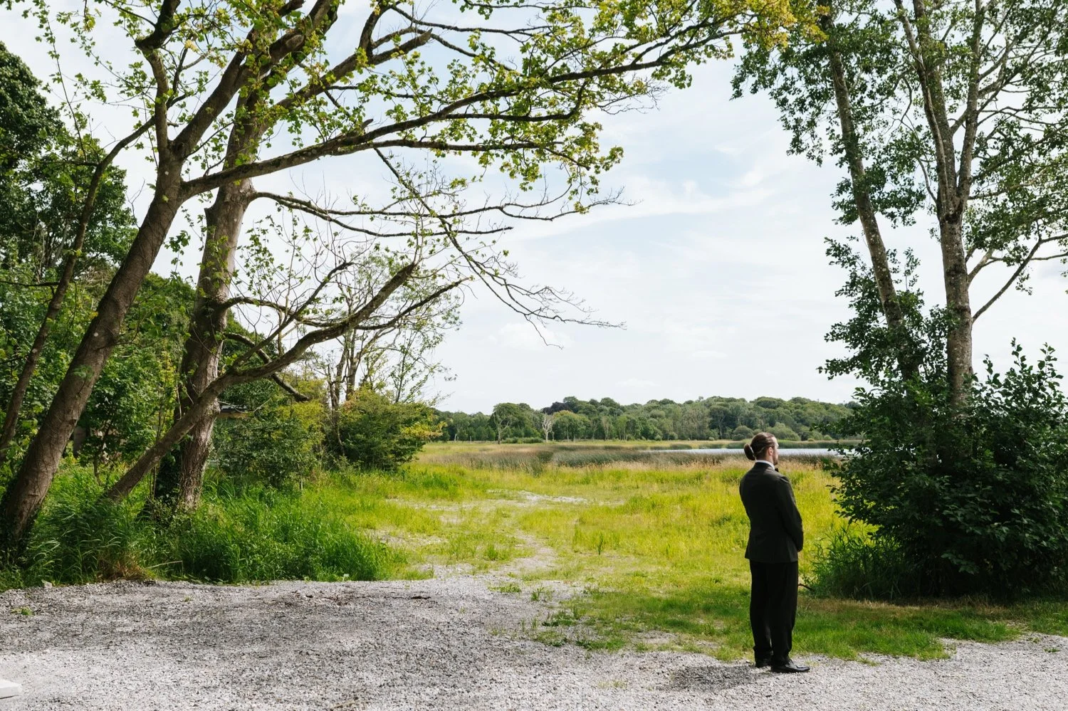 Bride and groom first look by lake at Ashley Park House Tipperary