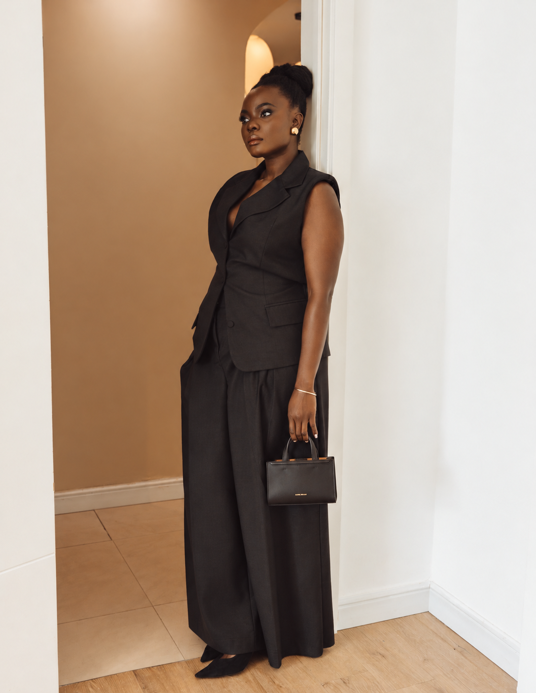 THE VEST + WIDE LEG DOORWAY PORTRAIT - BLACK.png