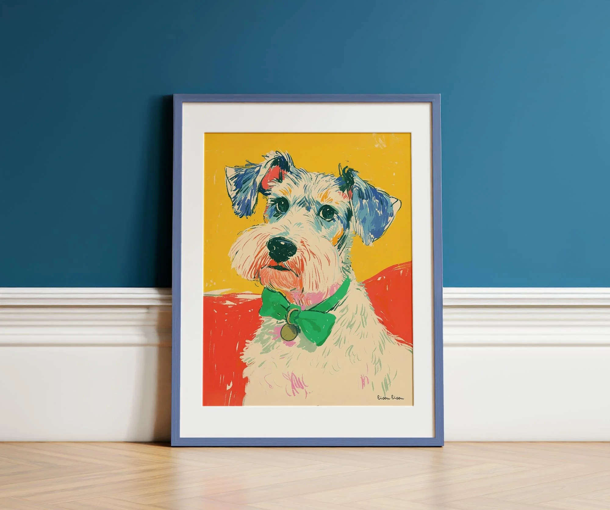 Colorful framed artwork of a dog with a green bowtie, placed on a wooden floor against a blue wall with decorative white paneling.