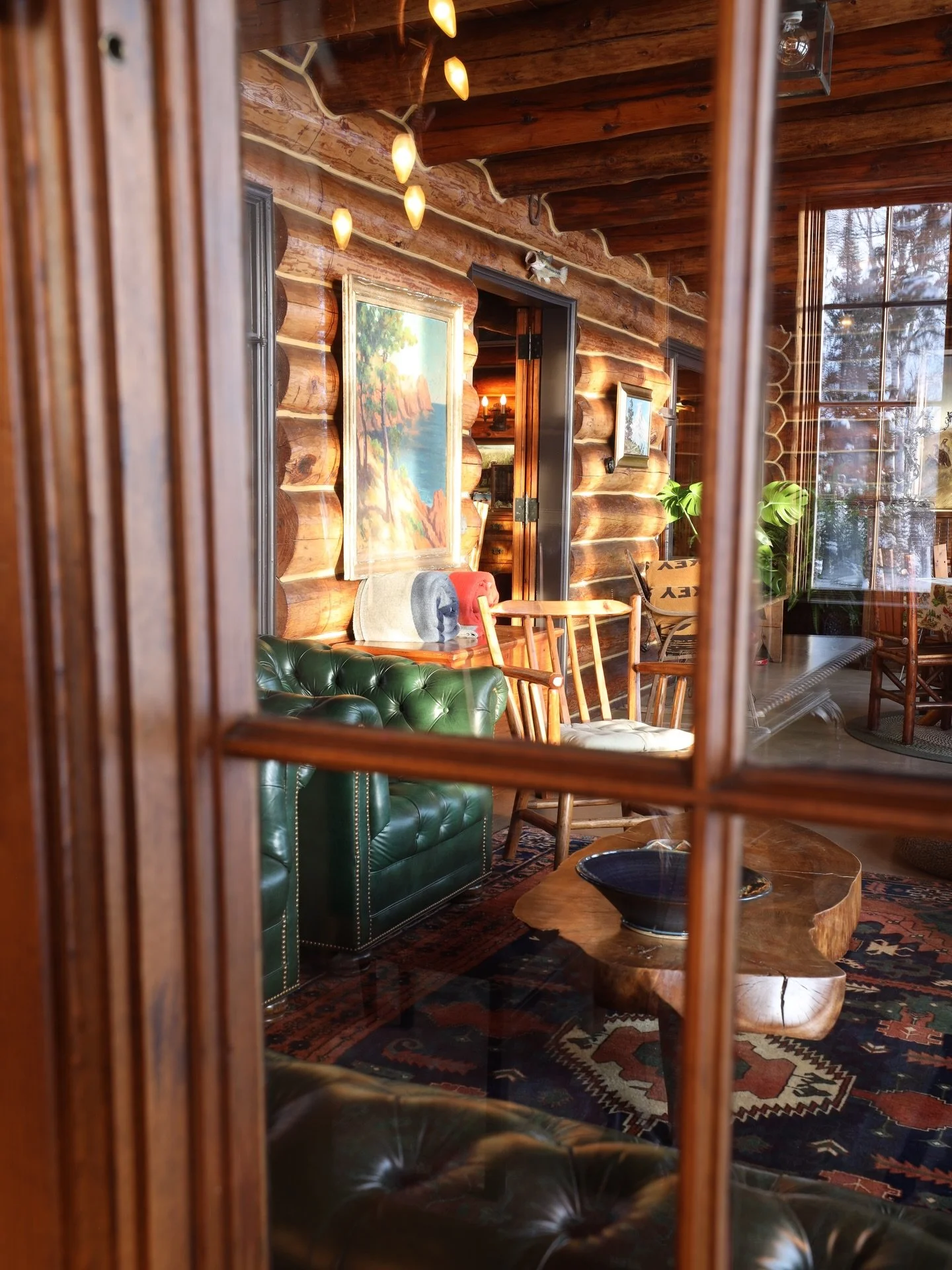 Late afternoon on the porch at Cohodas Lodge #logcabin #yooperlife #lakemichigamme