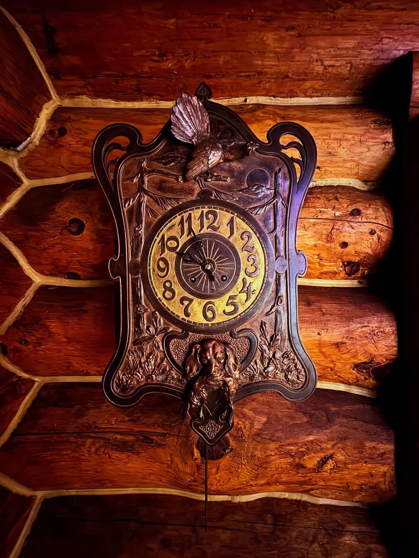 An old hunting clock we found in pieces in Germany back on the wall and keeping time again. #restoration #antiqueclock #huntinglodge