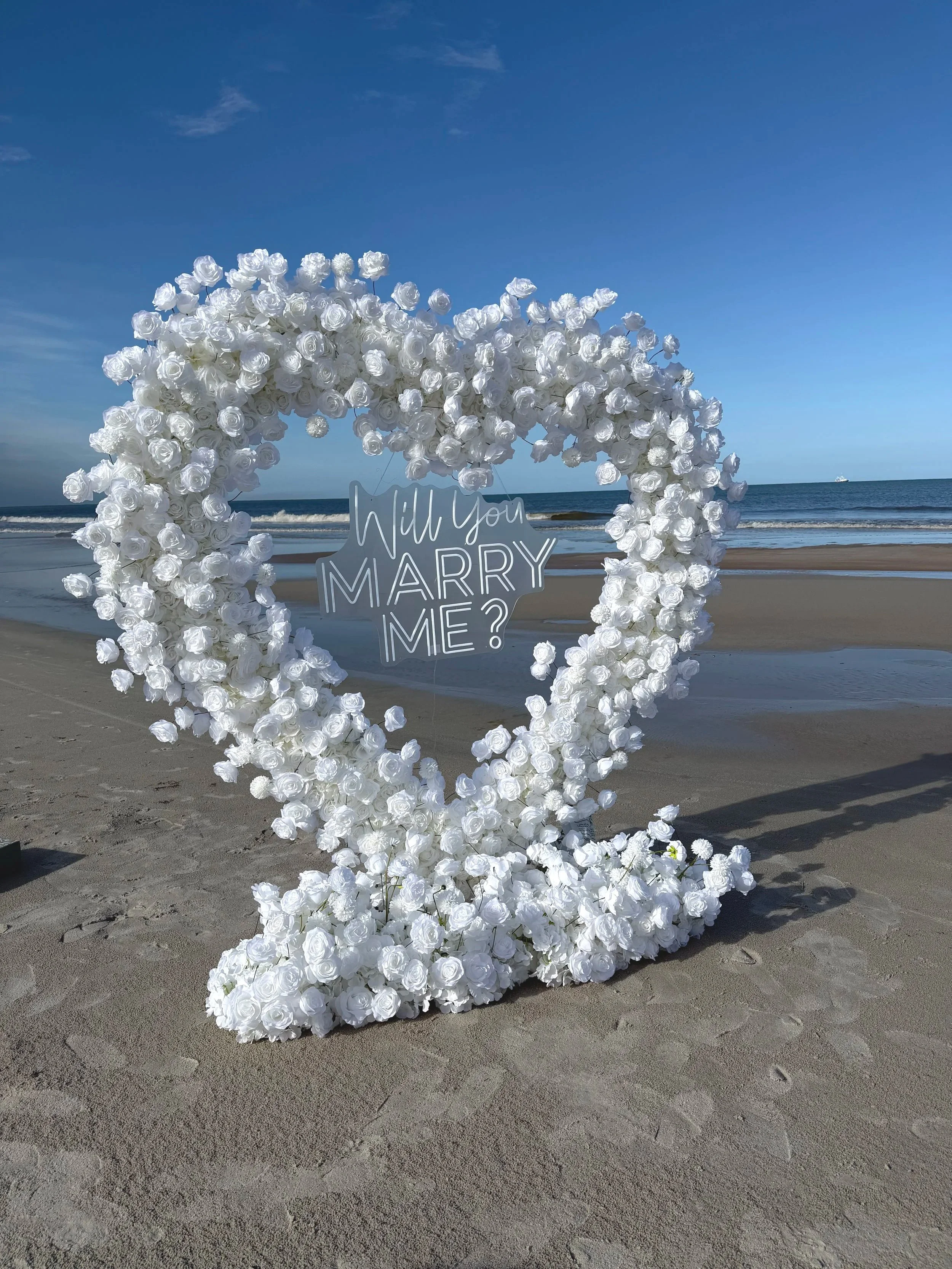 complete proposal setup and flower arch in Clearwater Beach, FL