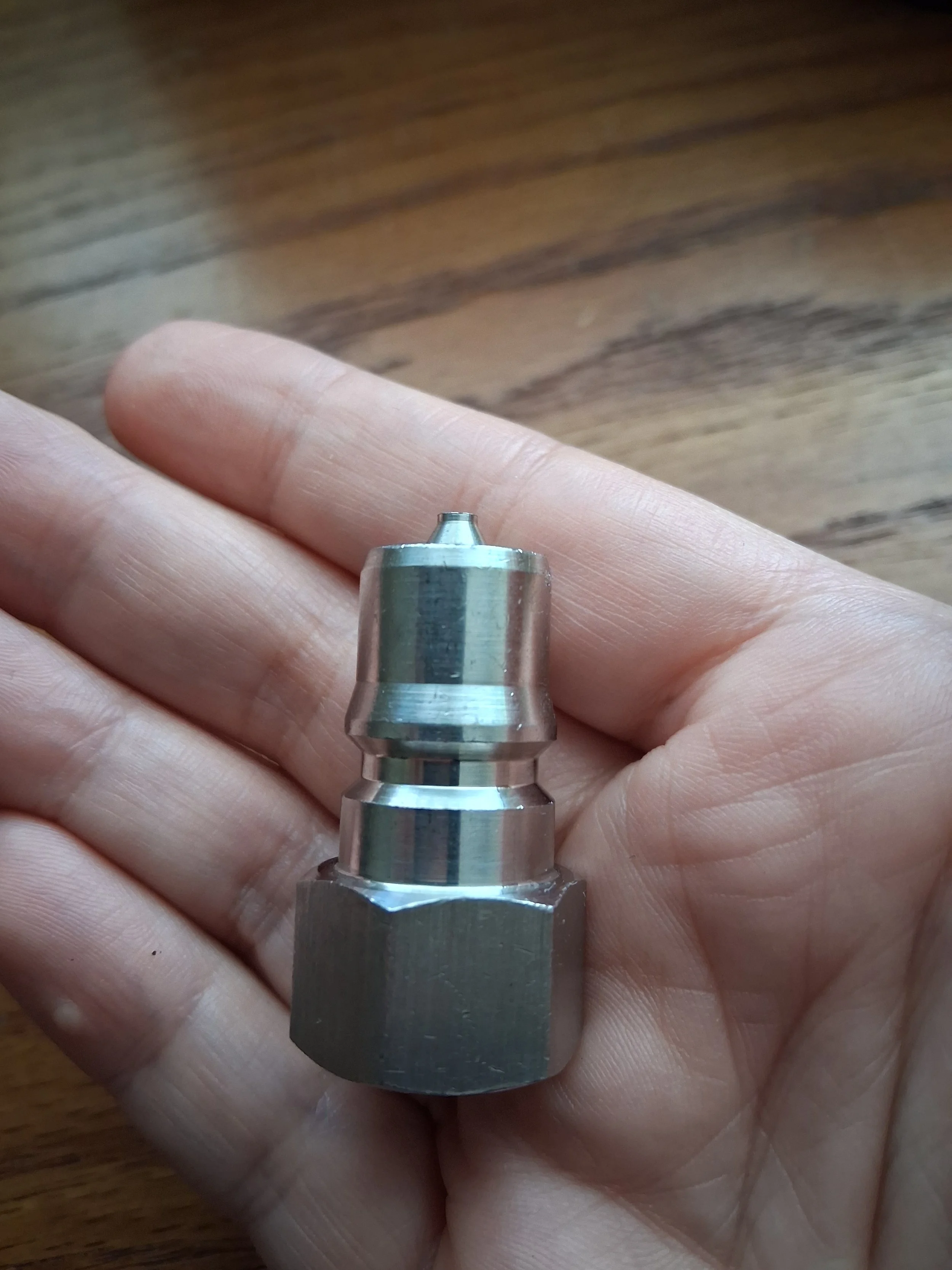 Rust-resistant stainless steel 1/4 inch male  quick disconnect for high-pressure carpet cleaning solution lines, rated for 3000 PSI.