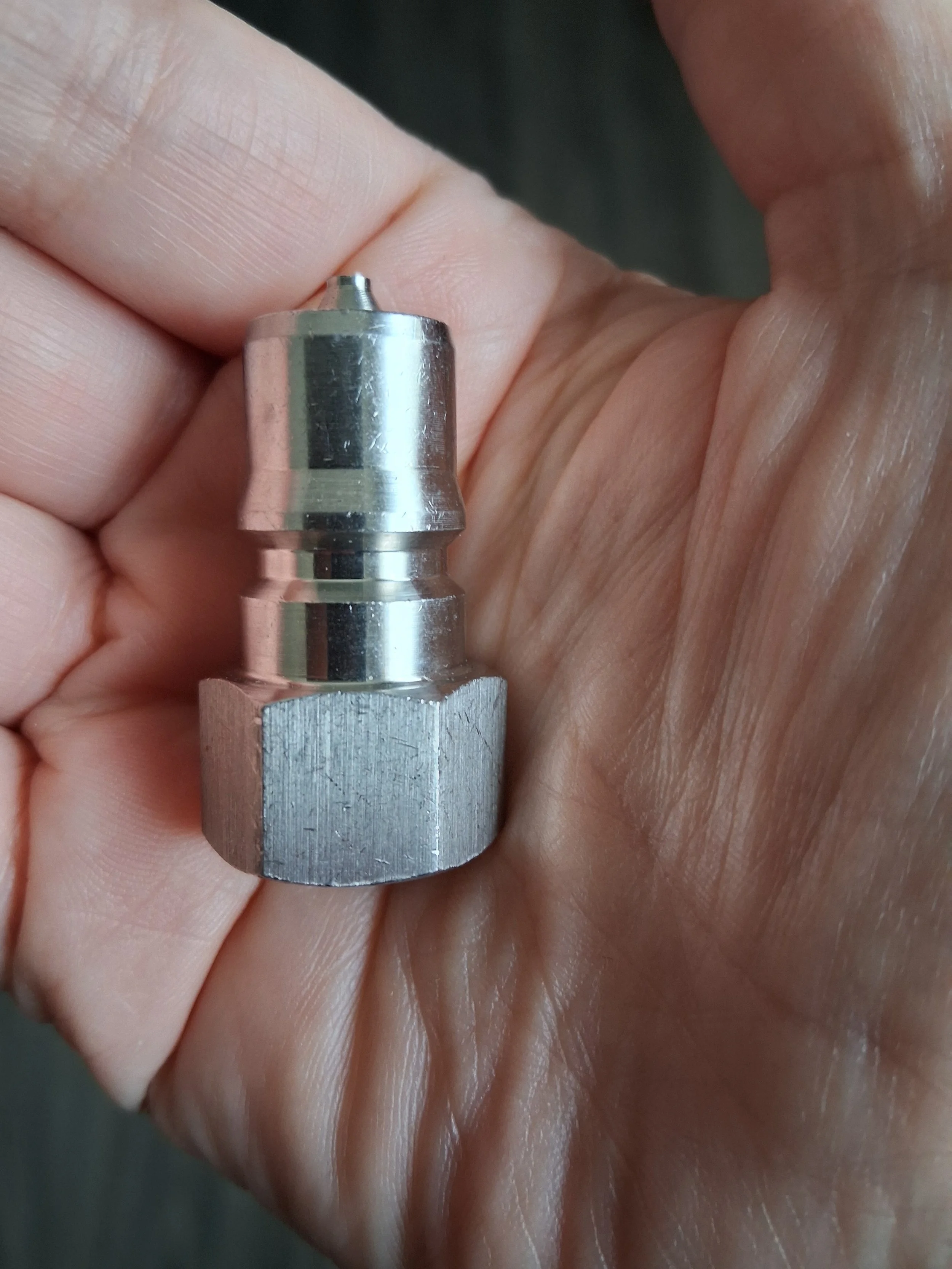 Rust-resistant stainless steel 1/4 inch male  quick disconnect for high-pressure carpet cleaning solution lines, rated for 3000 PSI.