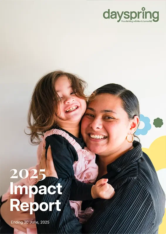 Cover image of Annual Review - mother holding her young daughter.