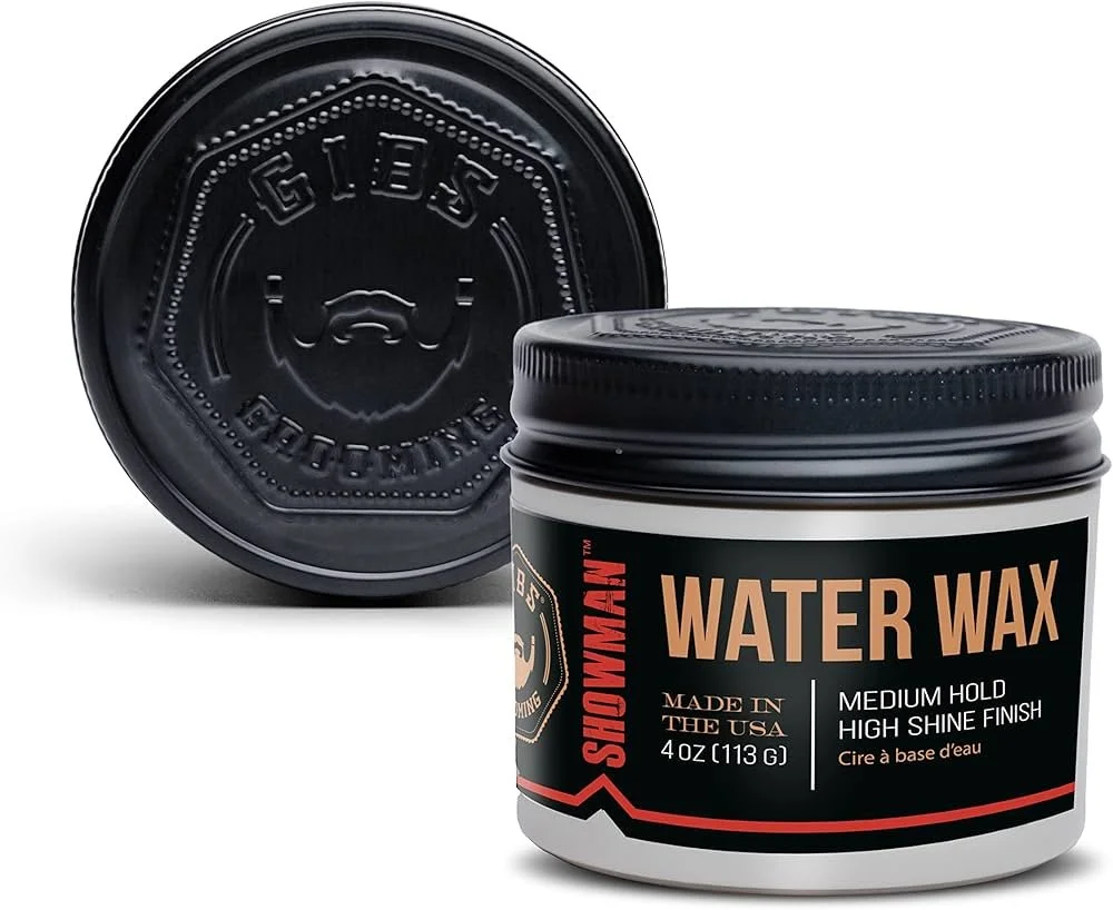 A black container of Shogun Water Wax with a matching lid, labeled for medium hold and high shine finish, made in the USA, with the lid also branded with the Shogun logo.