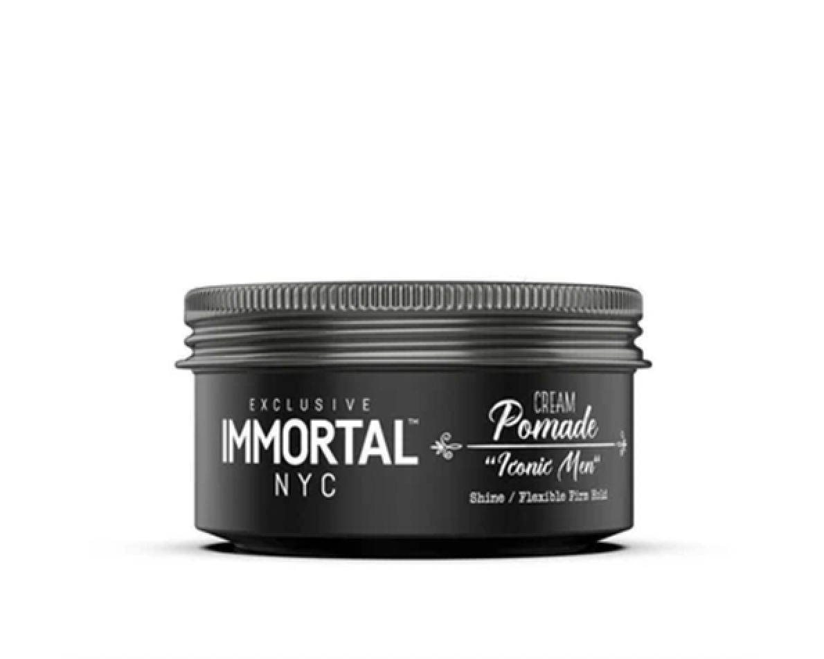 A black jar of Immortal NYC Cream Pomade labeled 'Tonic Mew' with a screw-on lid.