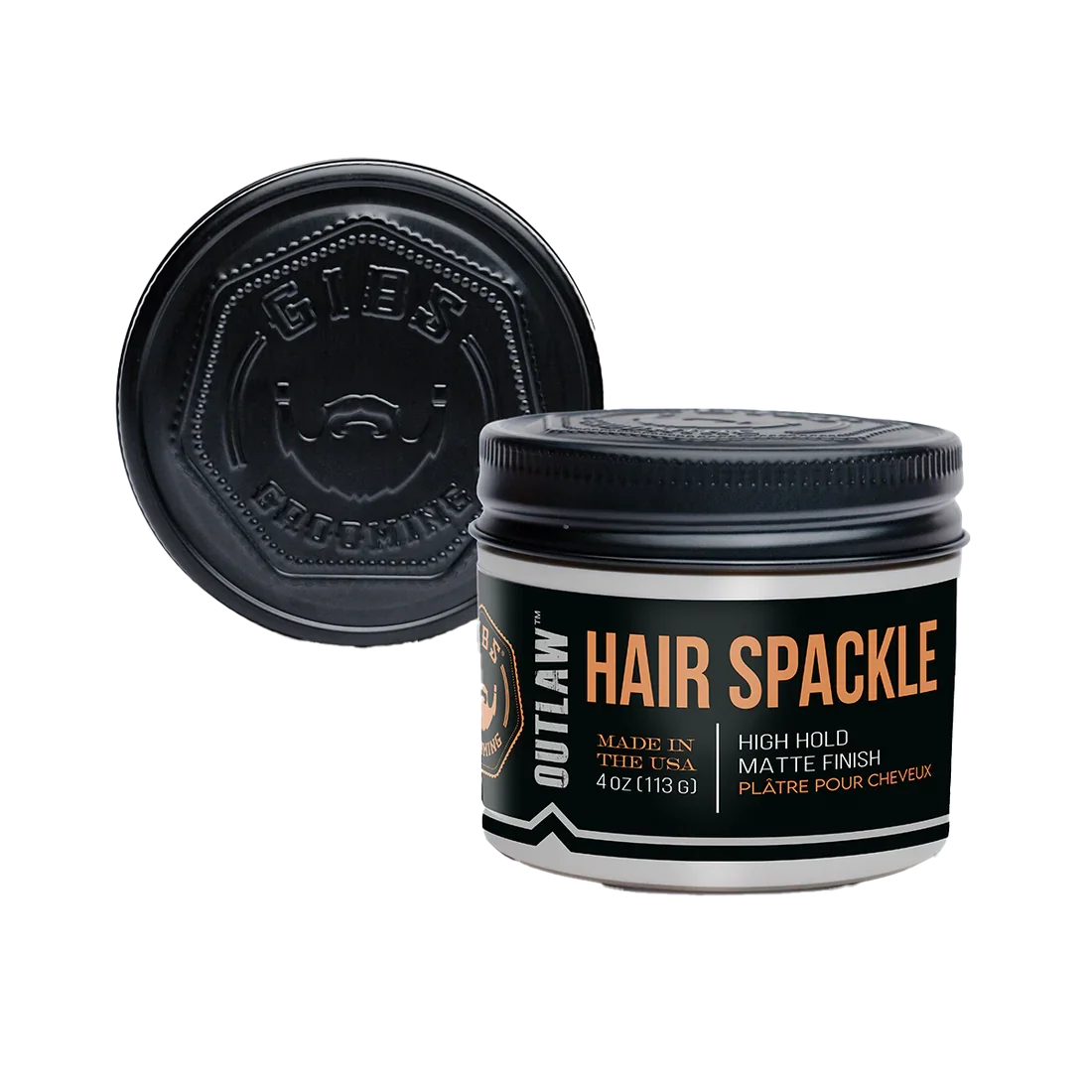A container of hair styling product called OUTLAW HAIR SPARKLE with black matte finish. The container is black with orange and white text, and a lid with embossed design.