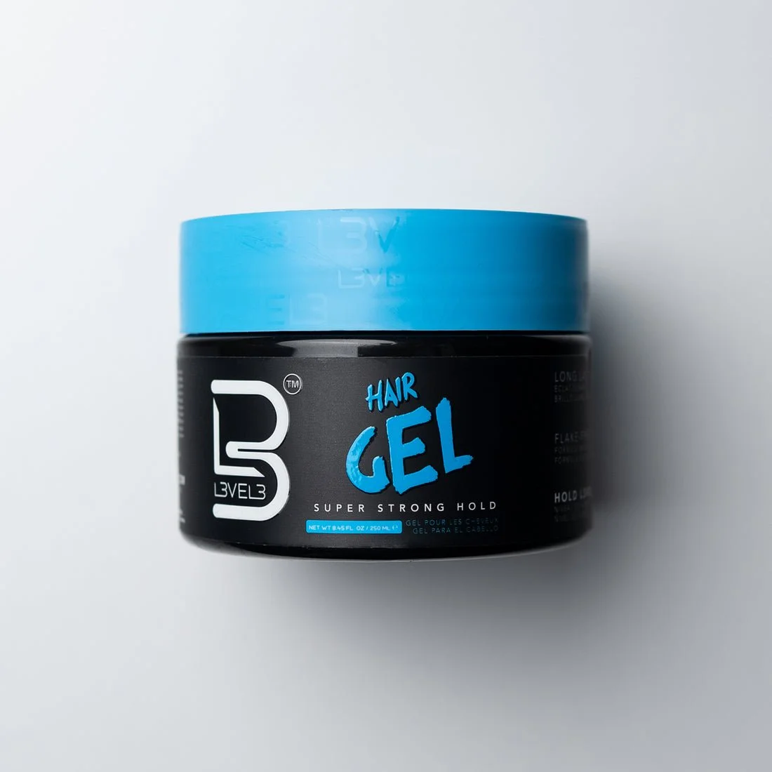 Container of B3 Hair Gel with blue lid and label, indicating super strong hold.