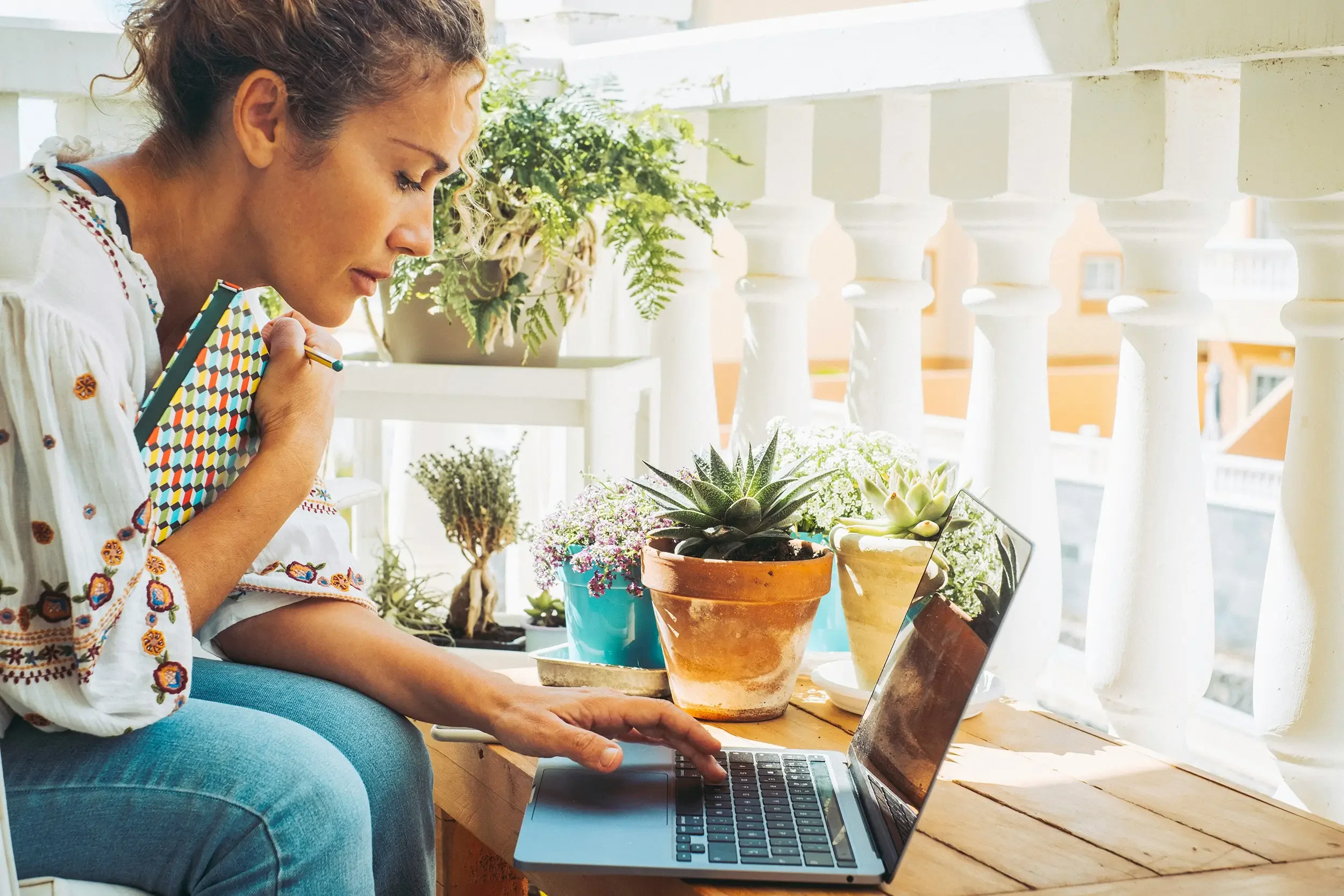 Woman looking at computer representing identity shifts