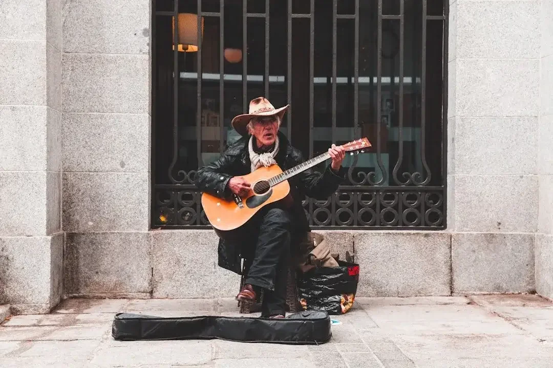 Man playing guitar representing feeling off