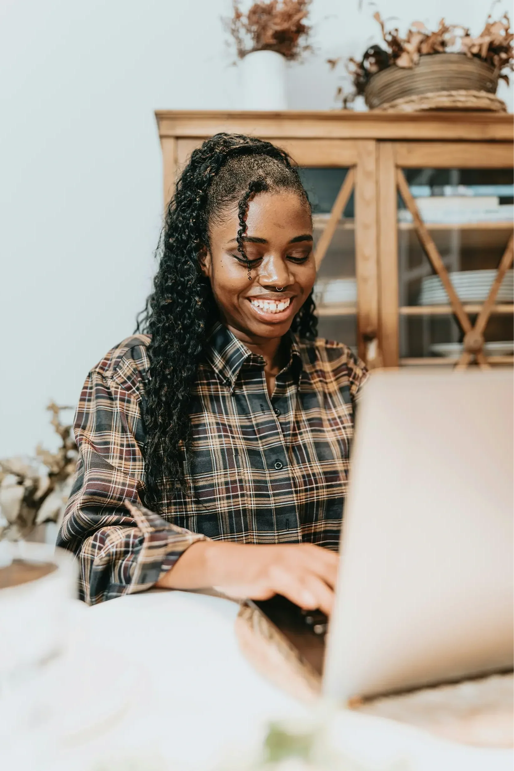 Woman on computer during telehealth therapy visit for ADHD