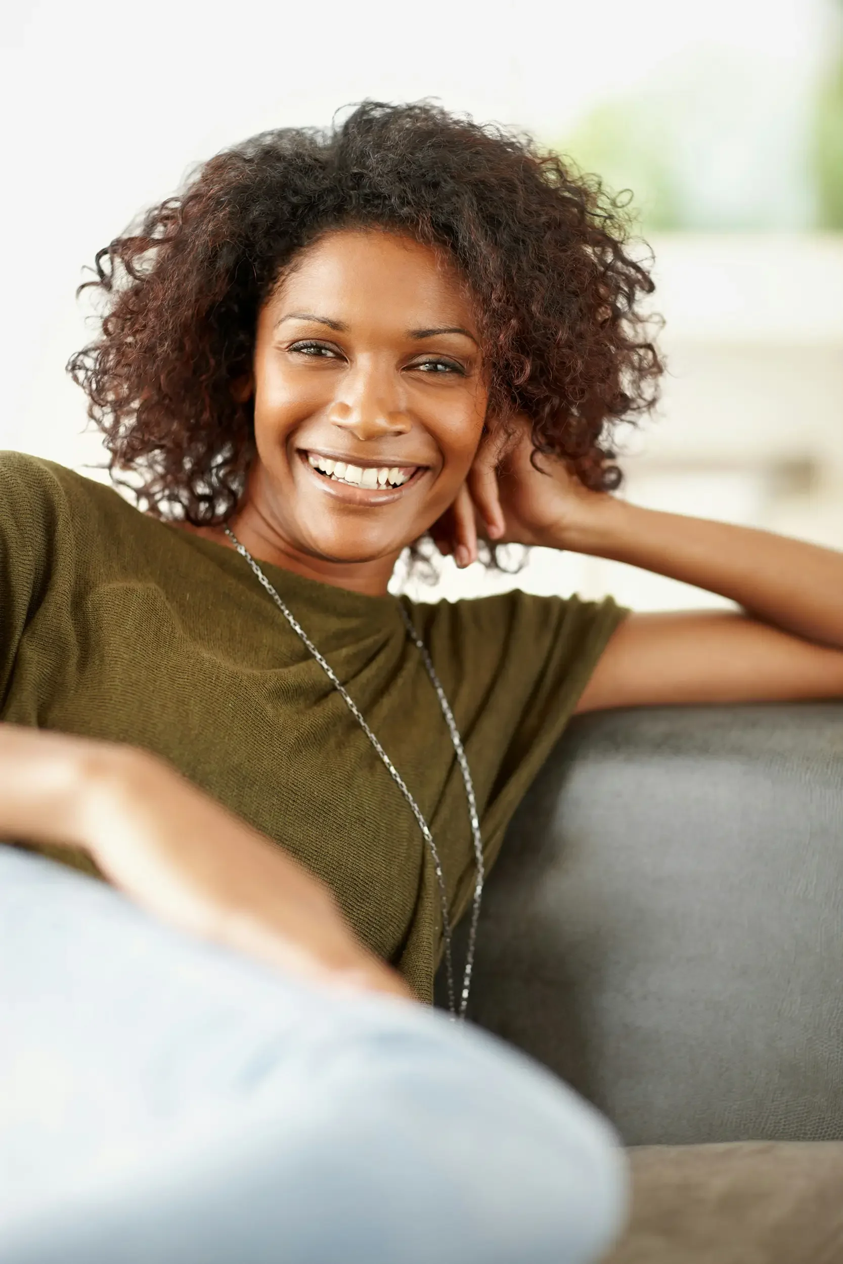 Woman smiling after therapy for ADHD in Plymouth, MI