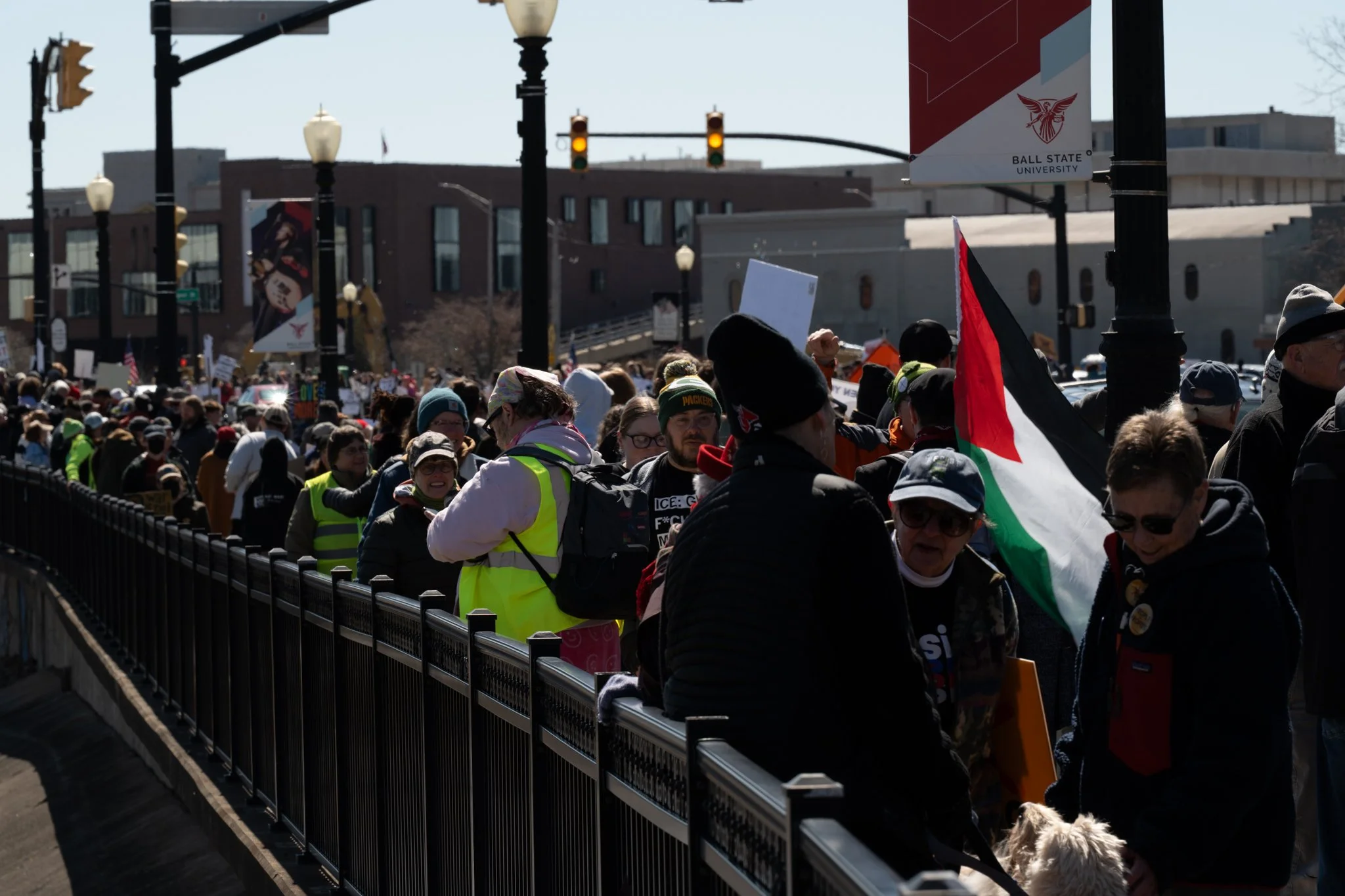 Protesters line the Fallen Heroes Memorial during the ‘No Kings 3’ protest March 28 in downtown Muncie.