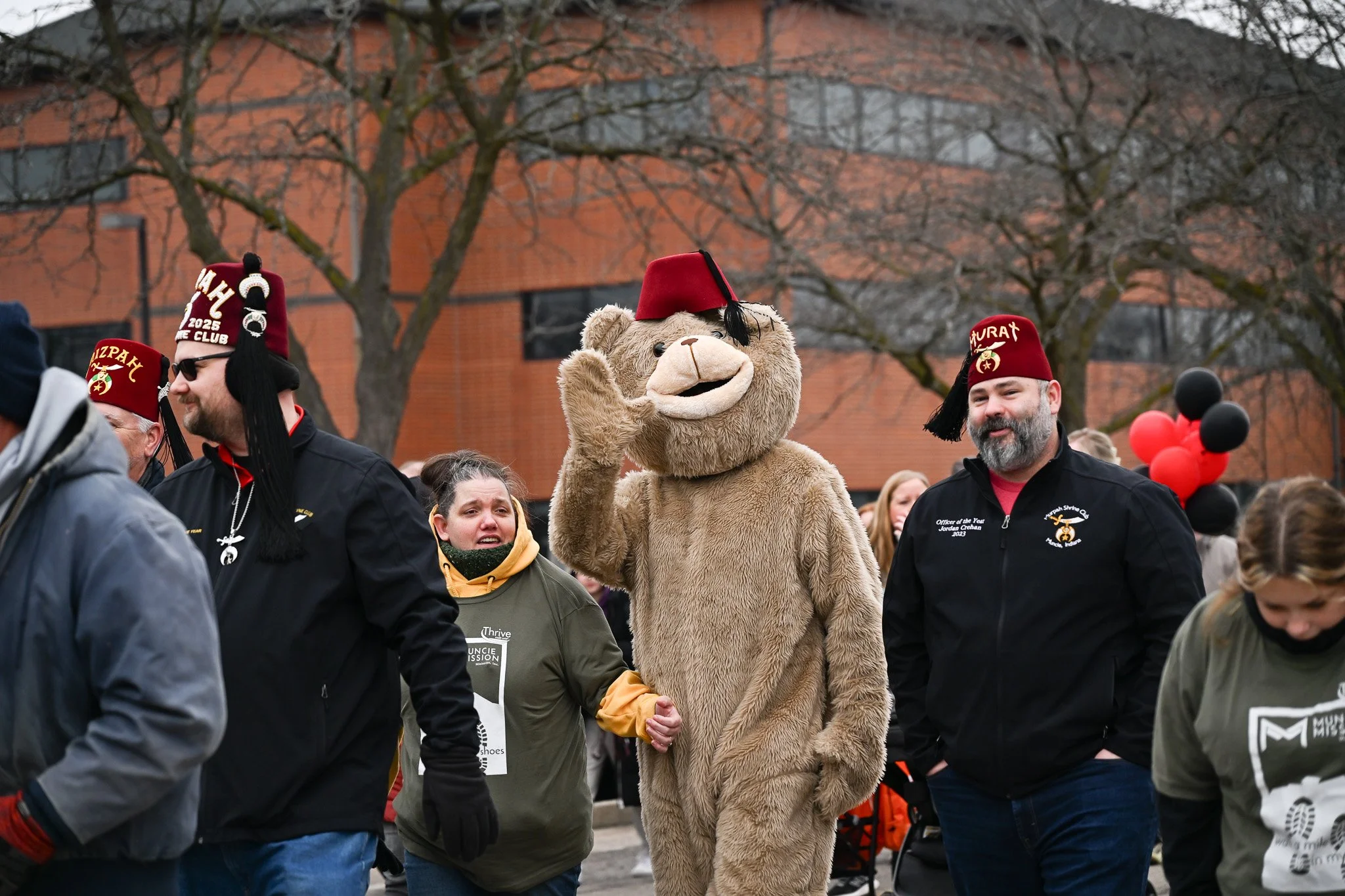 Members of the Murat Shriners club participate in Muncie Missison's Walk a Mile in My Shoes event Feb. 21 in Muncie, Indiana. 