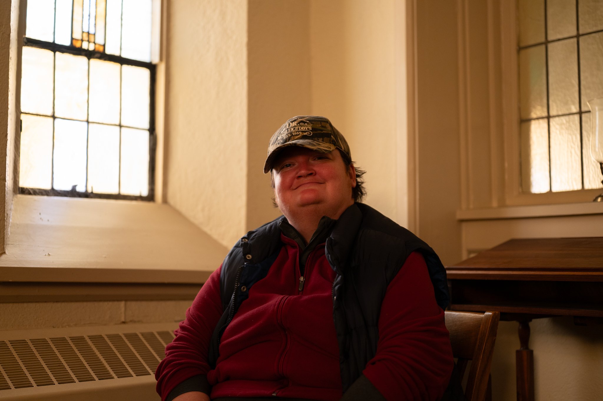 Kat Myers poses for a portrait in the sanctuary of the Recovery Cafe Muncie April 8 in Muncie, Indiana. Myers visits and volunteers for the cafe to find community and support during her process of recovery