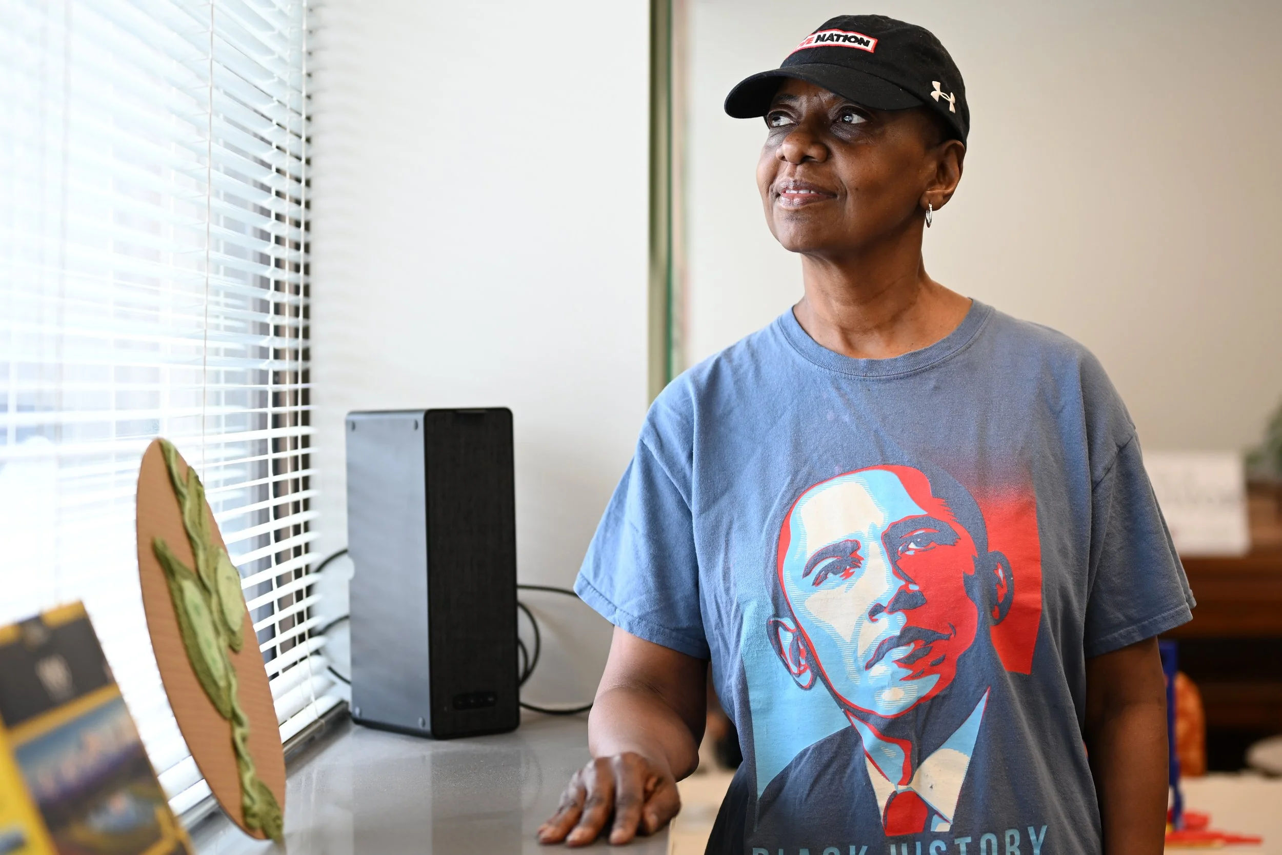 Reneé Jackson-Lester poses for a portrait during the Little Red Door Cancer Agency’s open house event Feb. 19 in Indianapolis. Lester is a client of Little Red Door and received a free wig from the nonprofit’s “Michele’s boutique” service.