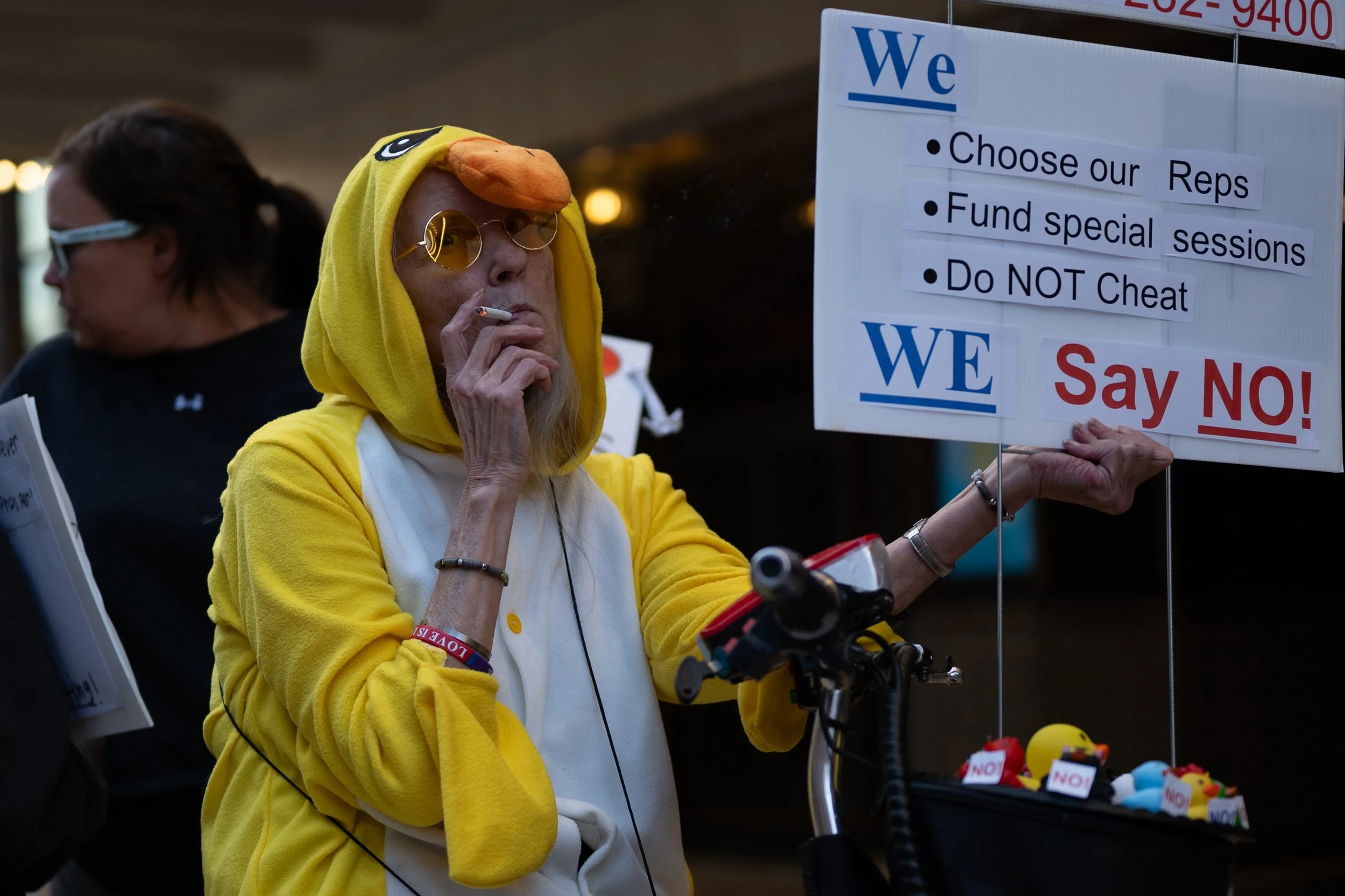 A protestor during the demonstration against mid-cycle redistricting October 2025 in downtown Indianapolis. 