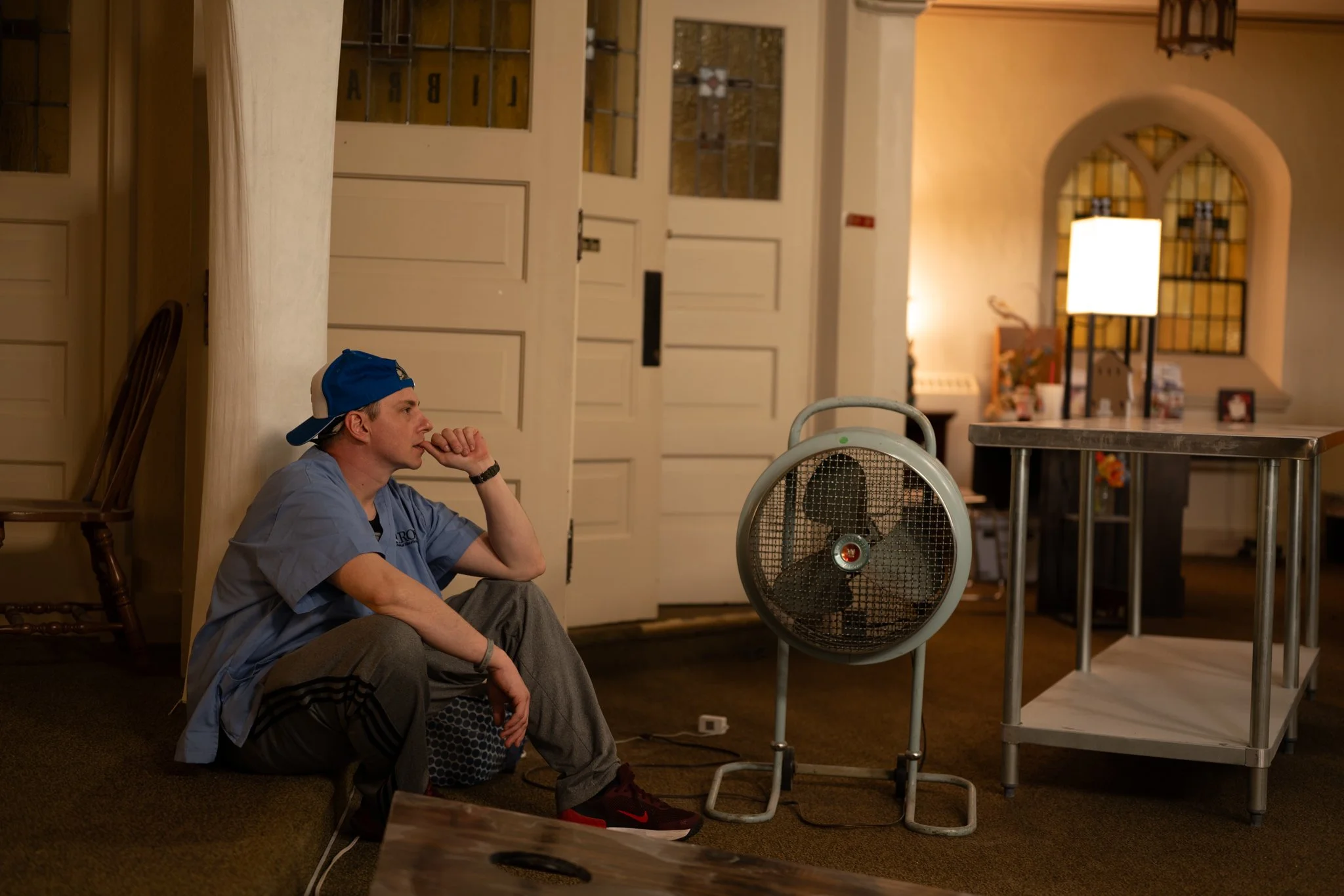 Recovery Café Muncie member Ronald Chenevert watches as a volunteer gives a presentation April 3 in downtown Muncie.