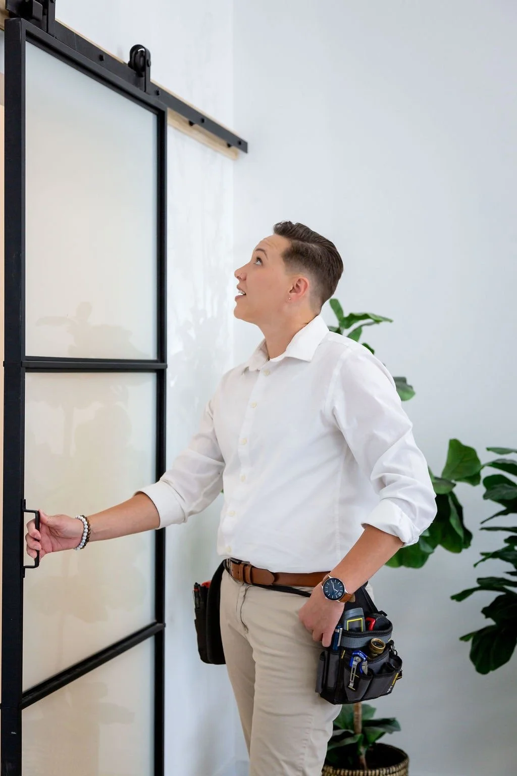 Inspector Inspecting a sliding door.
