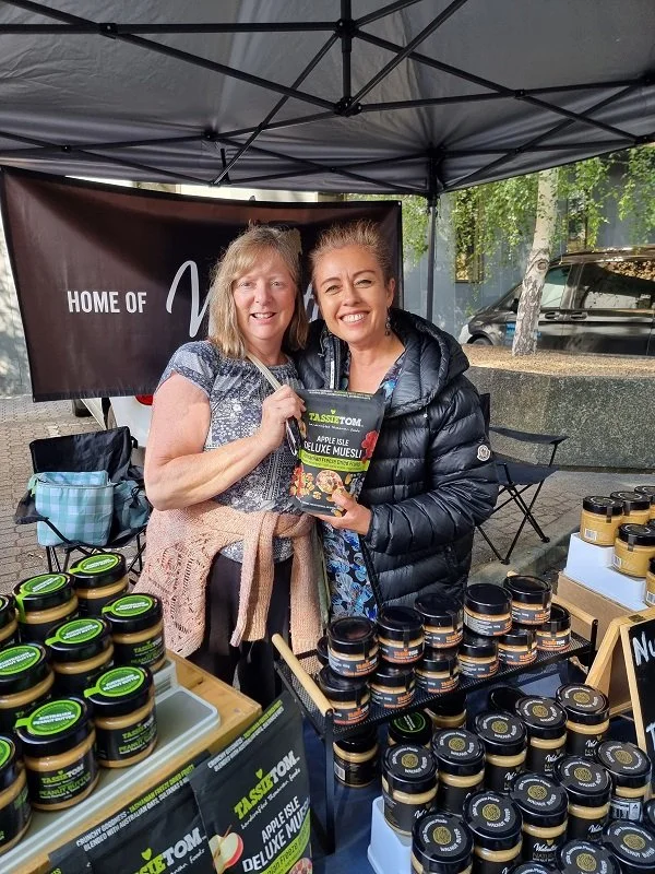 Carly from Hobart Food Co with her amazing stall at Salamanca Market.  Pictured with Apple Isle Deluxe Museli