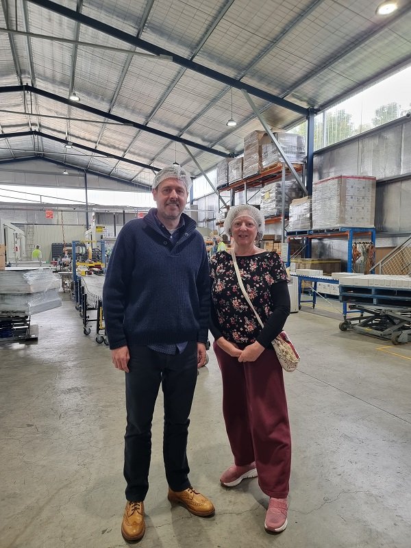 Ryan O'Donnell, Marketing and Sales Manager, Island Berries Tasmania showing Gillian their factory in Cambridge Tasmania.