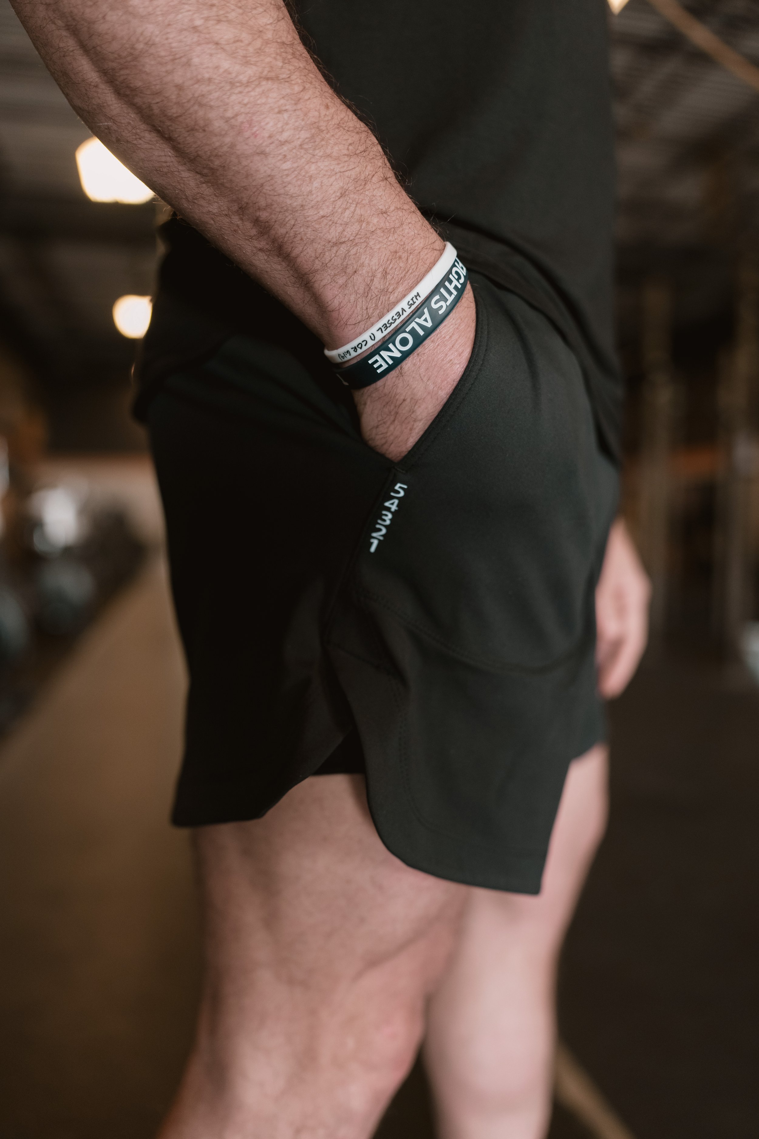 Iron + Bone Resurgence Short 5-4-3-2-1 grounding detail — men's black athletic training shorts