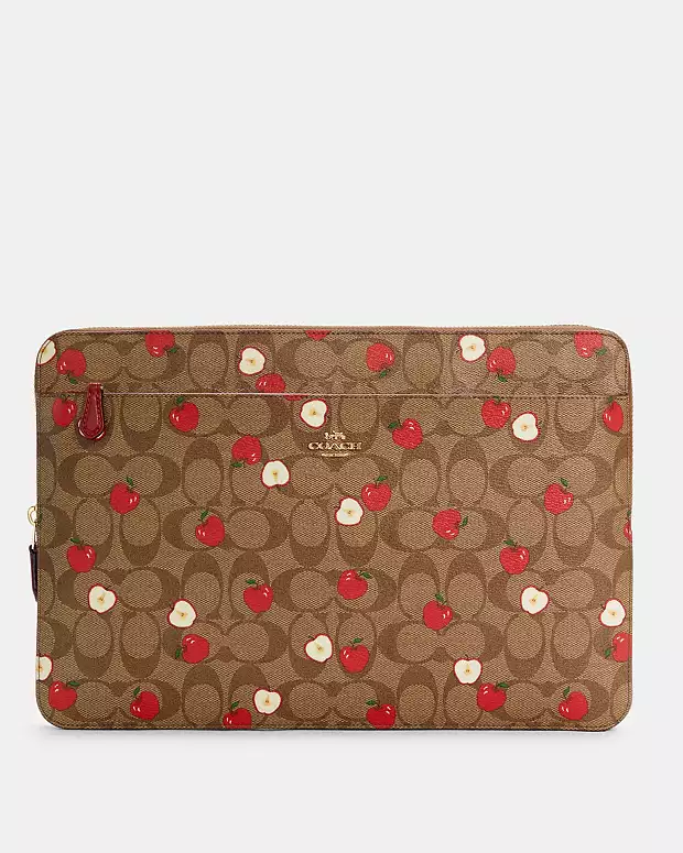 Coach brown laptop case with apple print