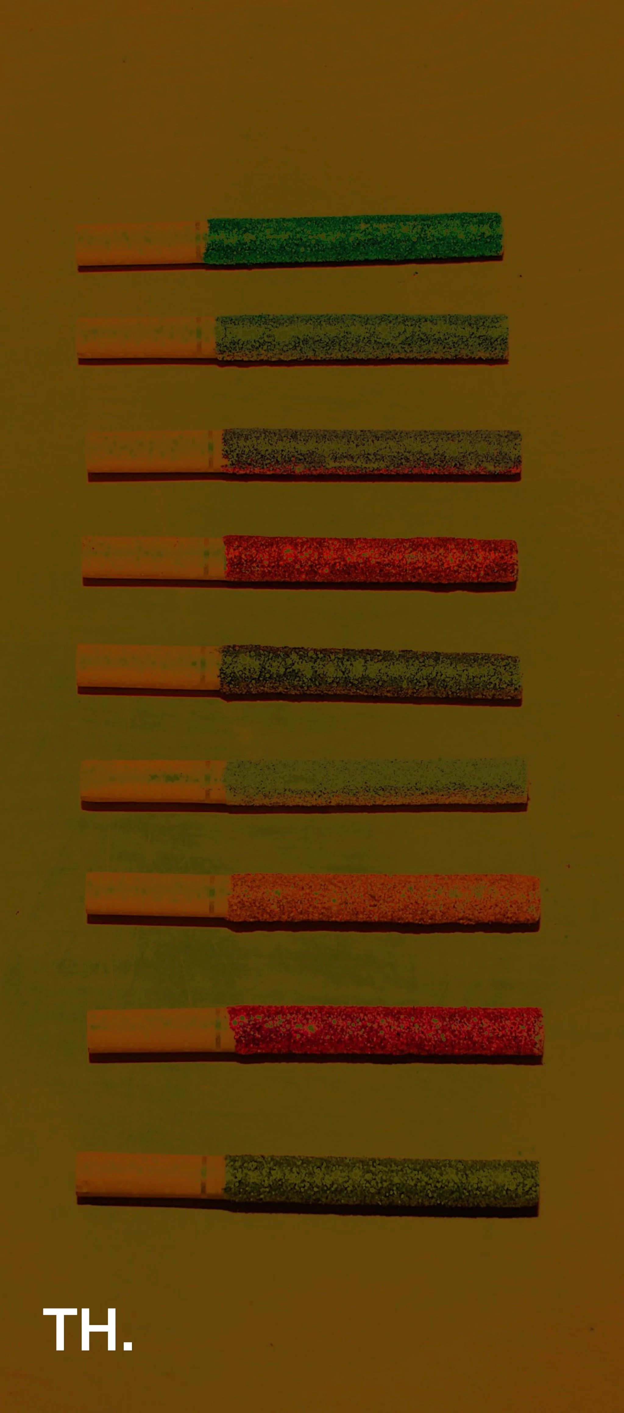 Several matchsticks laid horizontally on a surface, with some tips showing different colors and textures.