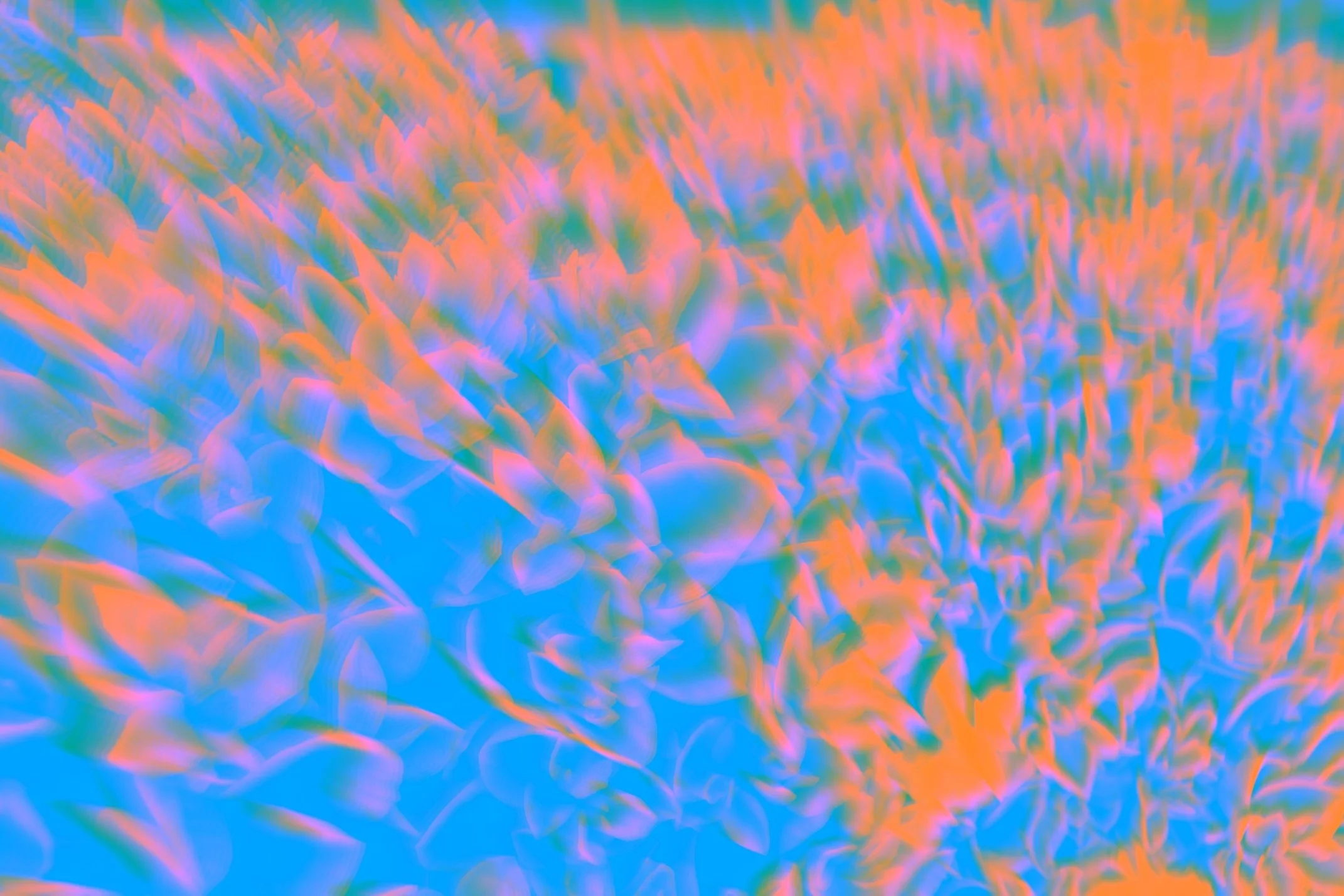 Abstract image with swirling pastel colors of pink, blue, orange, and purple.