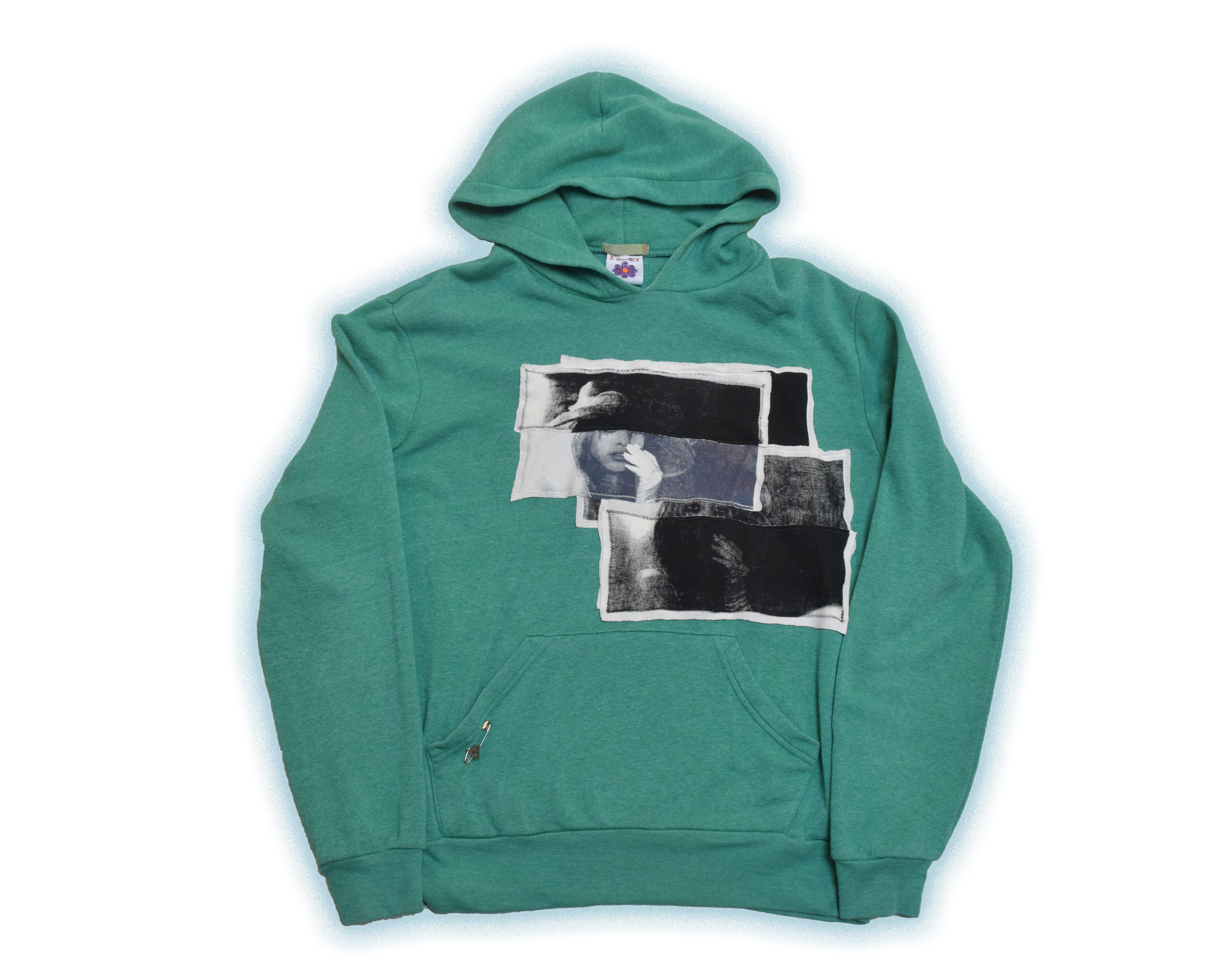 Green hoodie with a collage of black and white images of a woman wearing a large hat printed on the front.